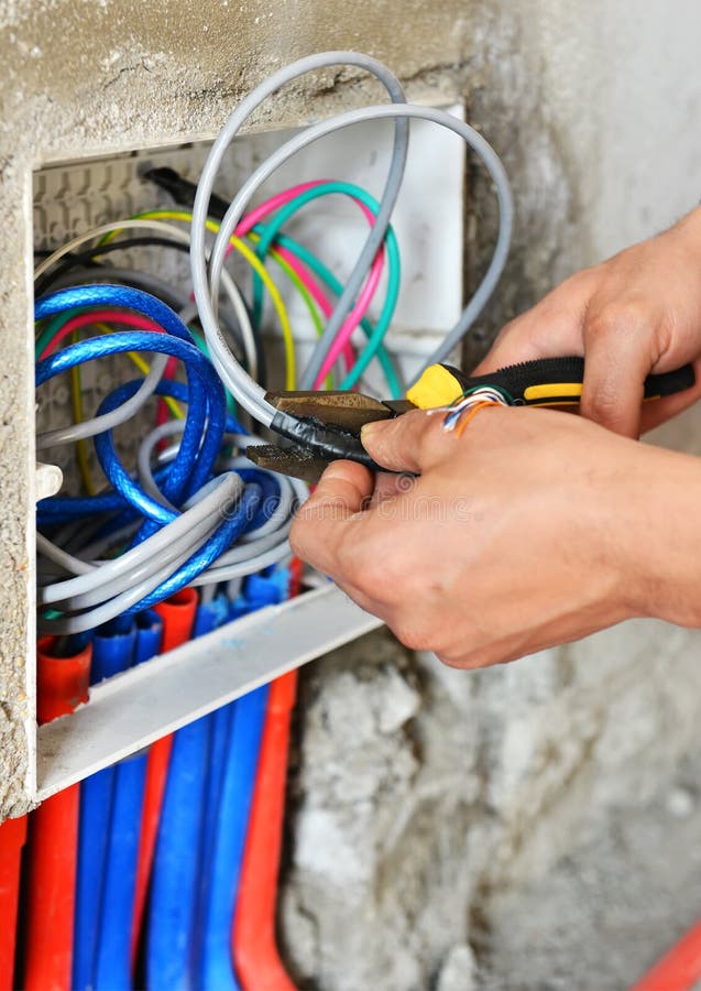 Electrician installing a switch socket royalty free stock image Electrician installing a switch socket royalty free stock image