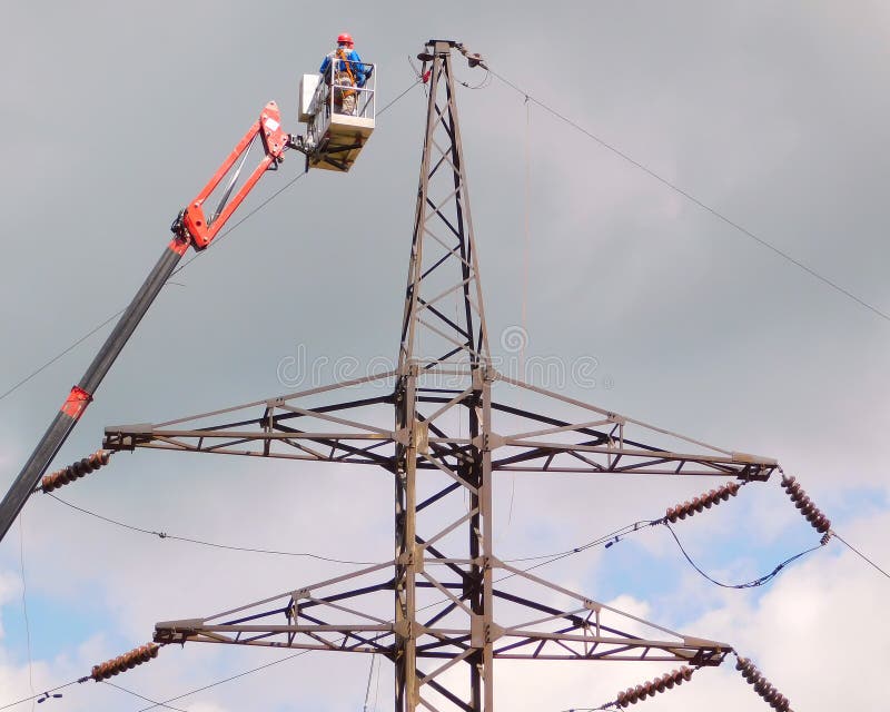 Electrician Repair of Electric Power System on Hydraulic Platform Stock