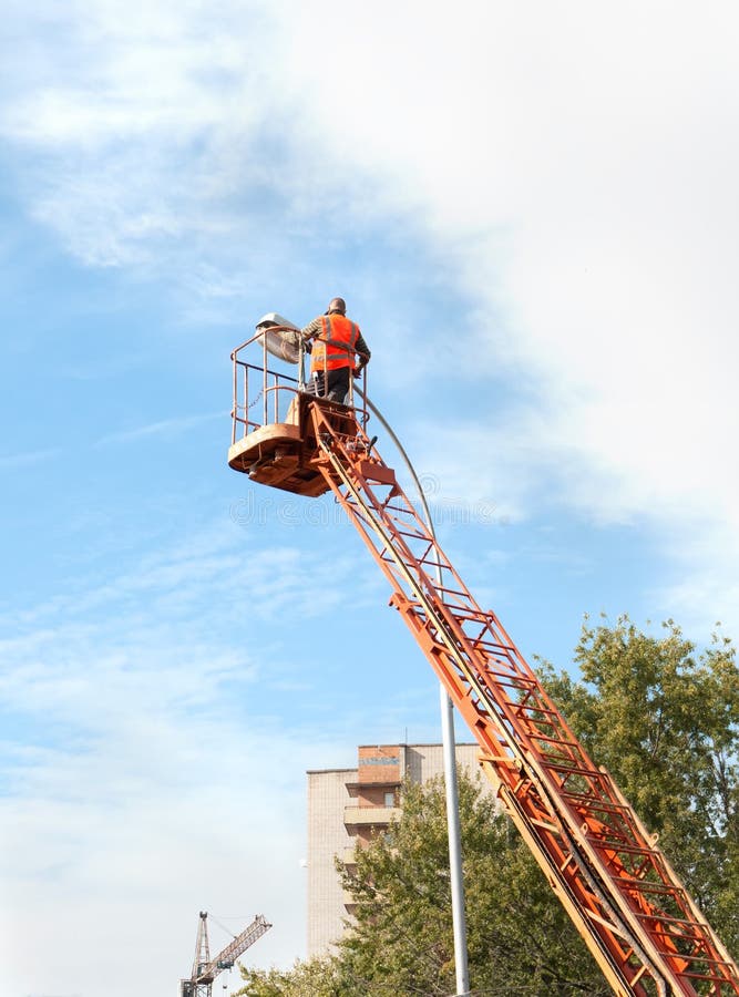 Electrician Repairing Street Light Stock Image Image of person