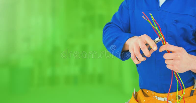 Electrician with wires cables on building site