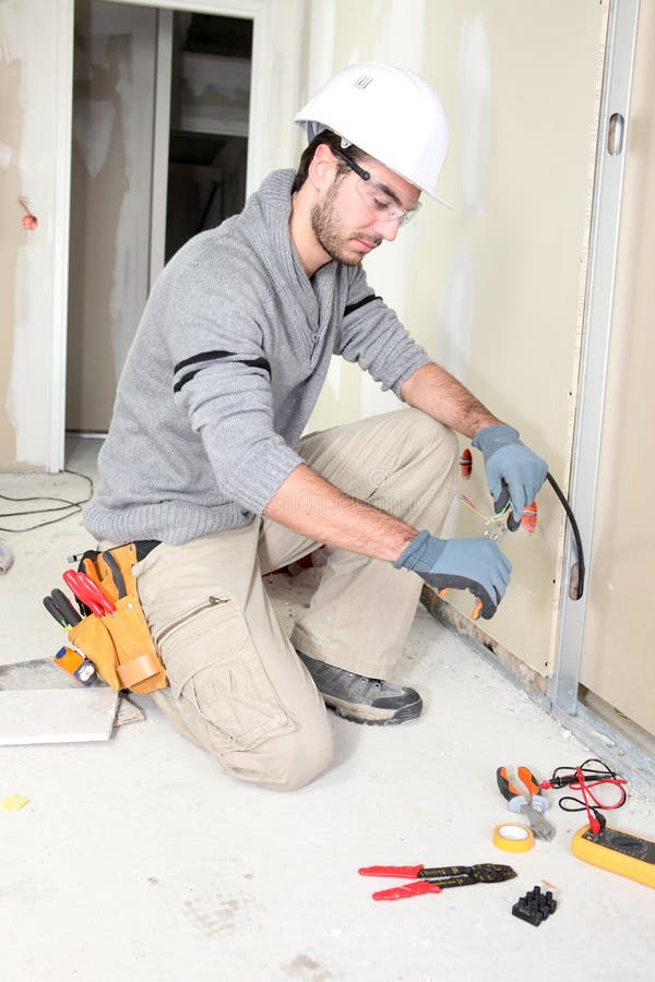 Electrician wiring a house royalty free stock photography
