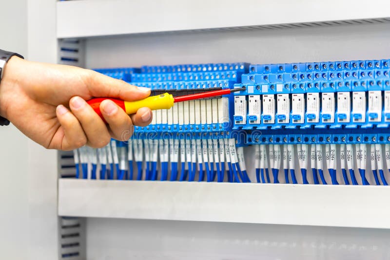 Electrician at work inspecting, repair and maintenance cable con stock images Electrician at work inspecting, repair and maintenance cable con stock images