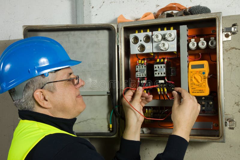 An Offshore Oil Rig Worker Used Meter To Measuring Voltage of Batteries