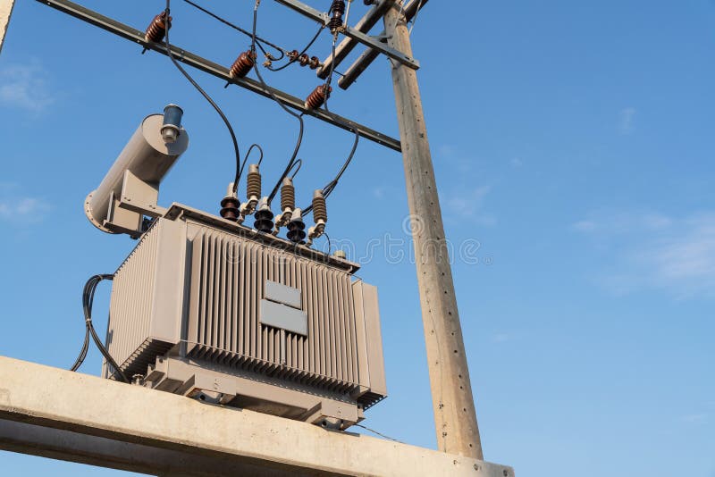 Electricity, Large Electric Transformers for the Community Stock Photo Image of blue