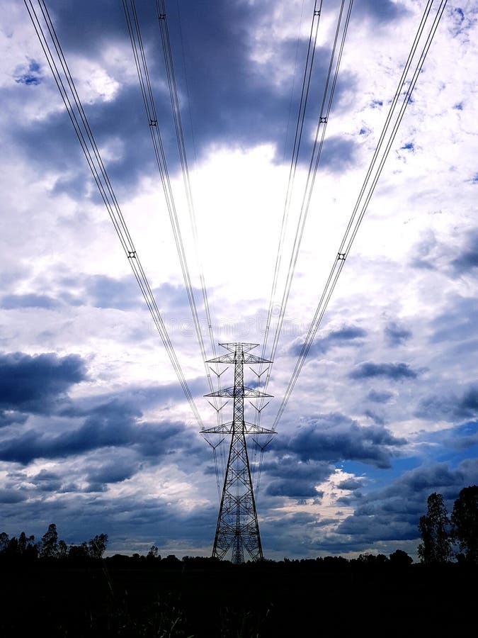 Electricity lines at dusk stock photo. Image of energy 358076