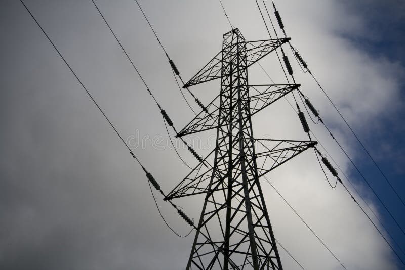 Electricity Pylon clouds and sky