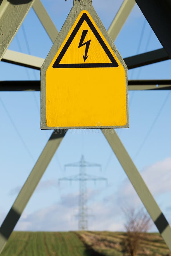 Electricity pylon with sign