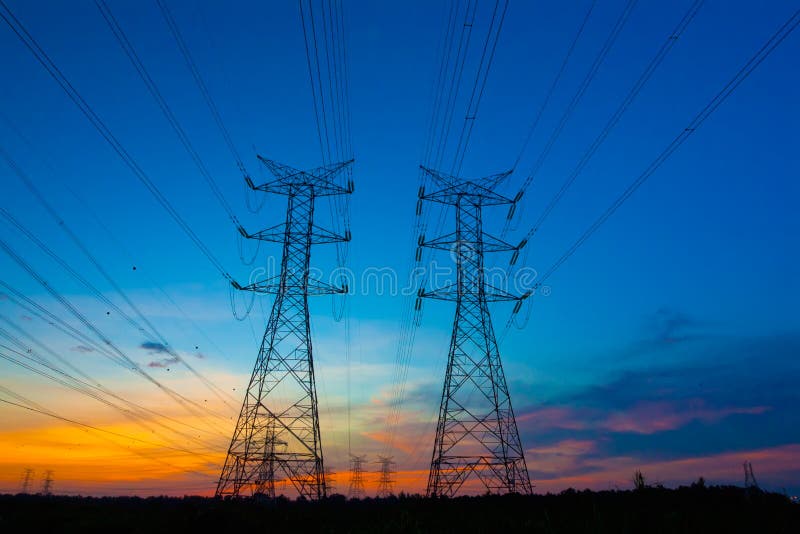 Electricity pylons at sunset