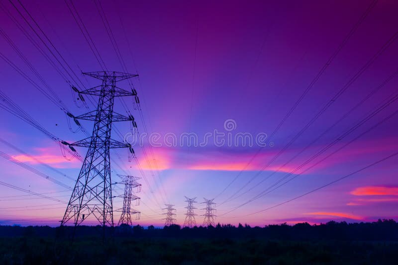 Electricity pylons at sunset