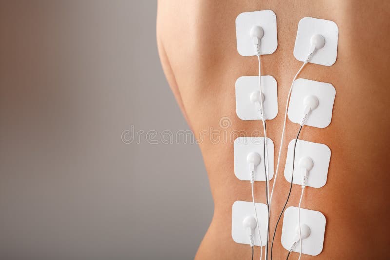 Muscle Stimulator with Electrodes, BacBack and Shoulder Massage with a Muscle  Stimulator with Attached Electrodes Along Stock Photo - Image of luxury,  electric: 206309420