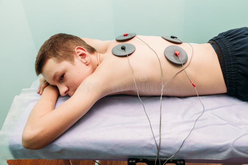 Decenas De Electrodos En Fisioterapia Imagen de archivo - Imagen