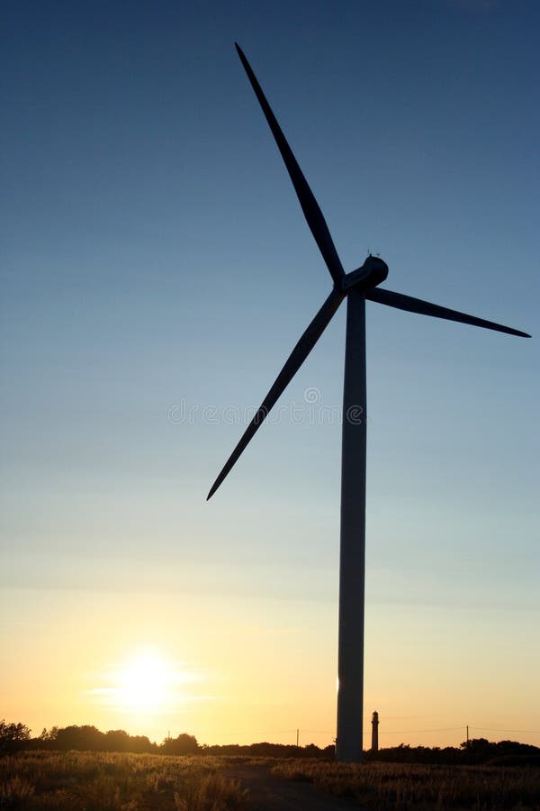 Sunset in Paldiski, Estonia, with wind electrogenerator. Sunset in Paldiski, Estonia, with wind electrogenerator