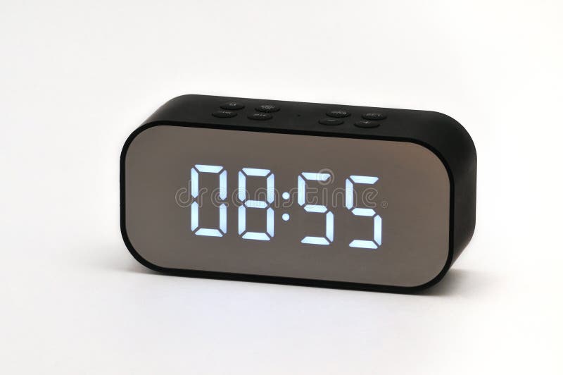 Electronic Clock with Digital Indication of Time and Date on a White