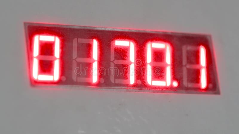 Electronic digital dial meter counter. Red numbers on the counter stock footage