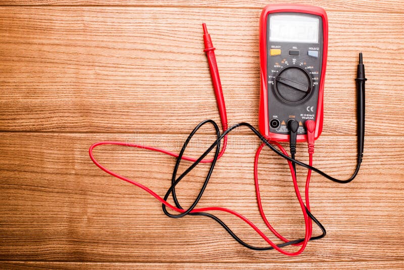 Electronic Digital Multimeter Isolated on White with Probes. Digital