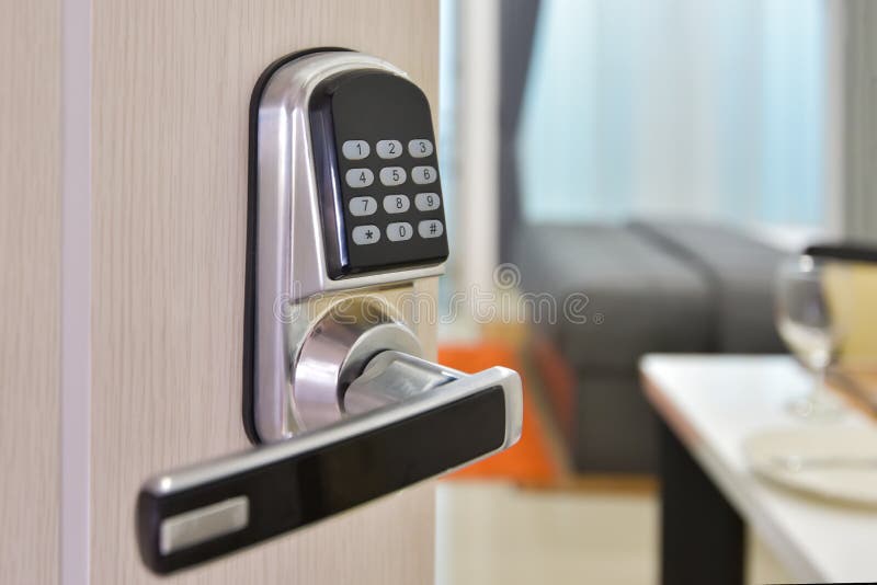 Electronic door access control system machine with number password door.. Half opened door handle closeup, entrance to a living stock image