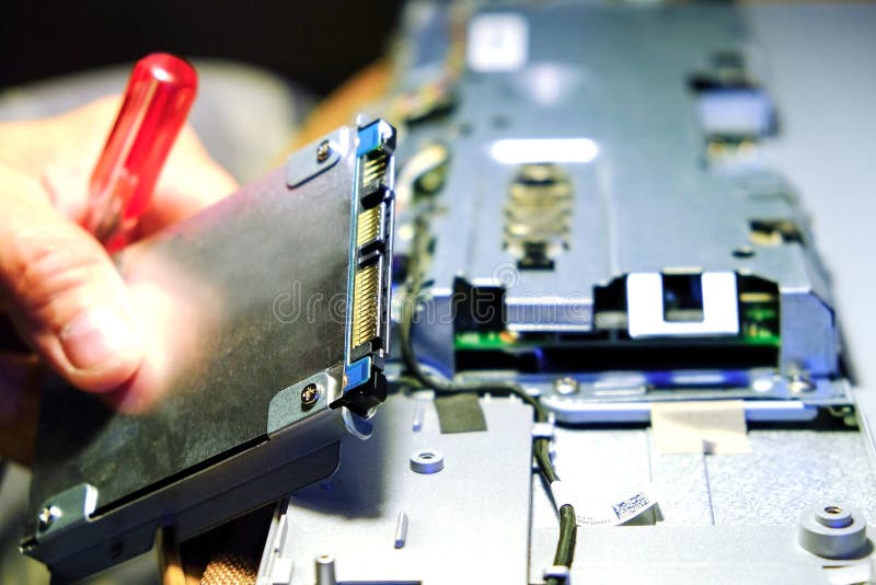 Service maintenance of computers. The wizard replaces the RAM, increasing the performance of the computer stock photos