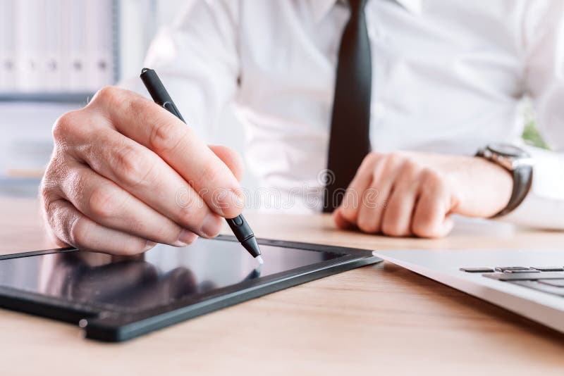 Electronic signature, businessman providing e-signature for document agreement using stylus and pad royalty free stock photos