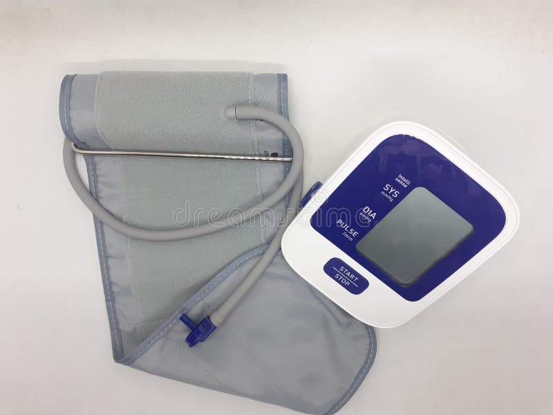 An electronic sphygmomanometer / blood pressure meter on white isolation background royalty free stock image