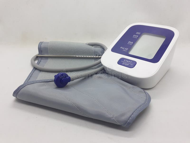 An electronic sphygmomanometer / blood pressure meter on white isolation background royalty free stock photography