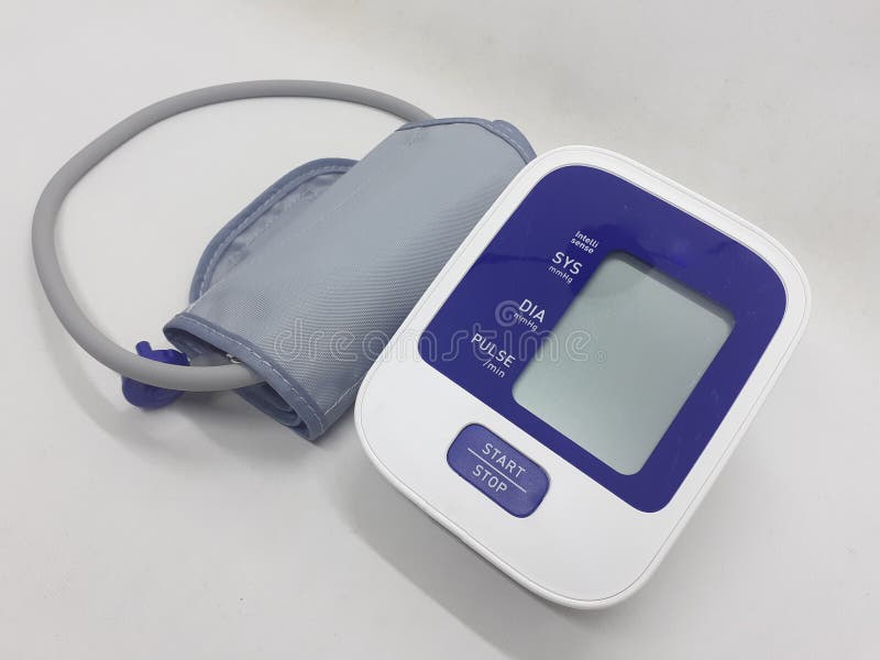 An electronic sphygmomanometer / blood pressure meter on white isolation background stock image