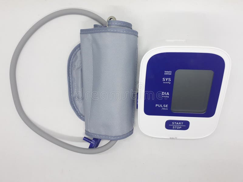 An electronic sphygmomanometer / blood pressure meter on white isolation background stock photography