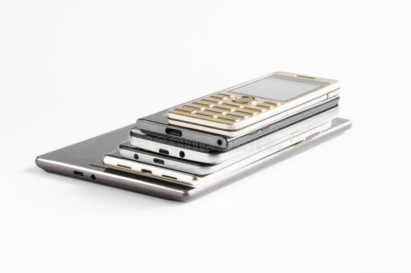 Electronic Tablet and Many Smartphones of Different Generations on a