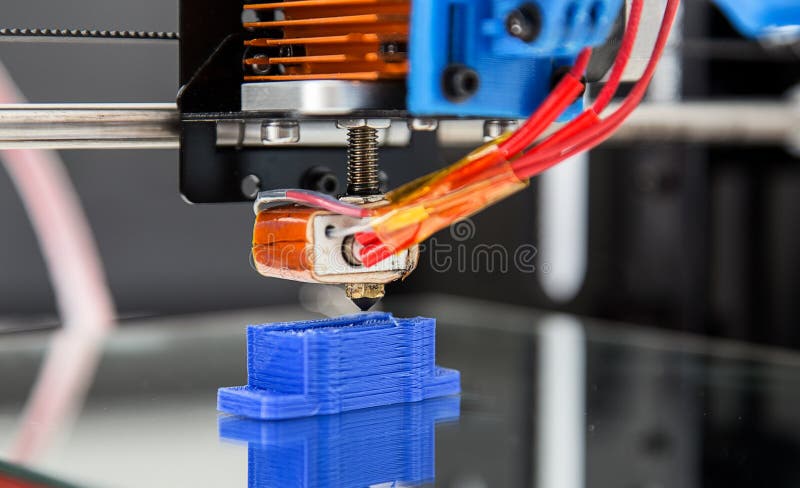 Electronic three dimensional plastic printer during work , 3D , printing.