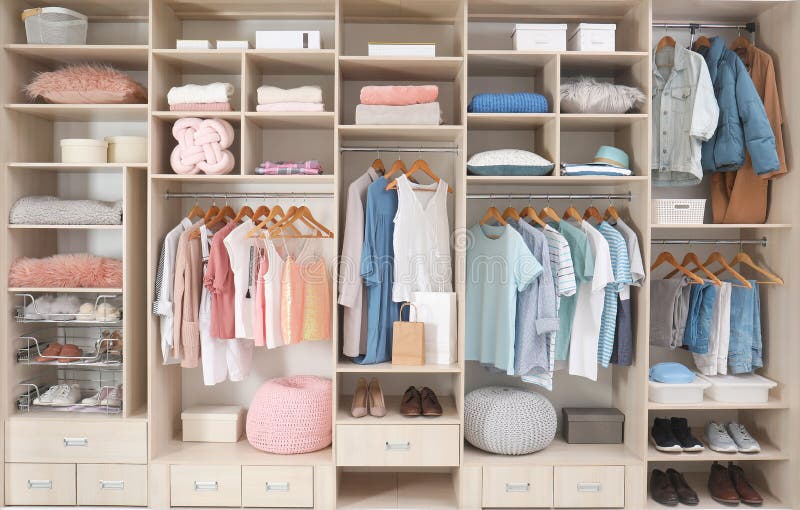 Stylish clothes, shoes and accessories in large wardrobe closet. Stylish clothes, shoes and accessories in large wardrobe closet