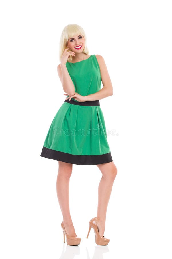 Elegance Blonde Girl in Green Dress Stock Photo - Image of chin, high ...