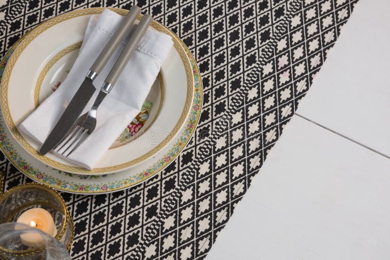 Elegance table setting with wine glasses on placemat stock photo Elegance table setting with wine glasses on placemat stock photo