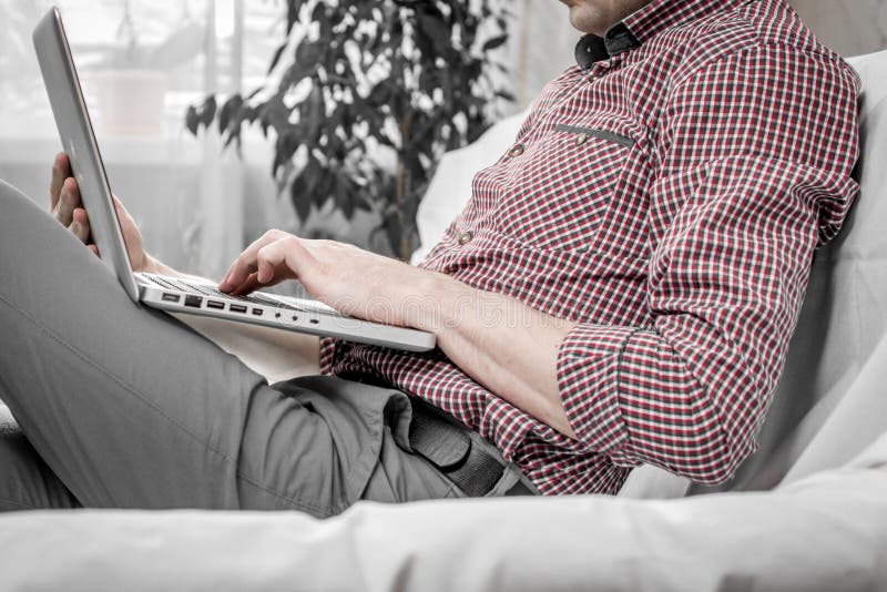 Elegant Business Multitasking Multimedia Man Using Devices at Home