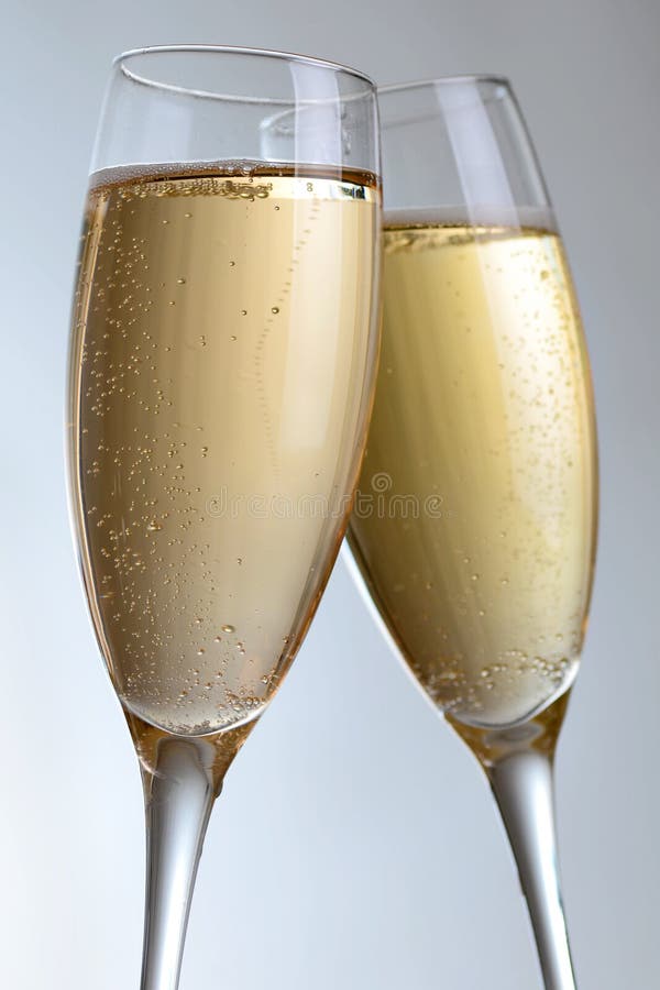 Two Elegant Champagne Glasses Stock Image Image of romance, bubbles 17821927
