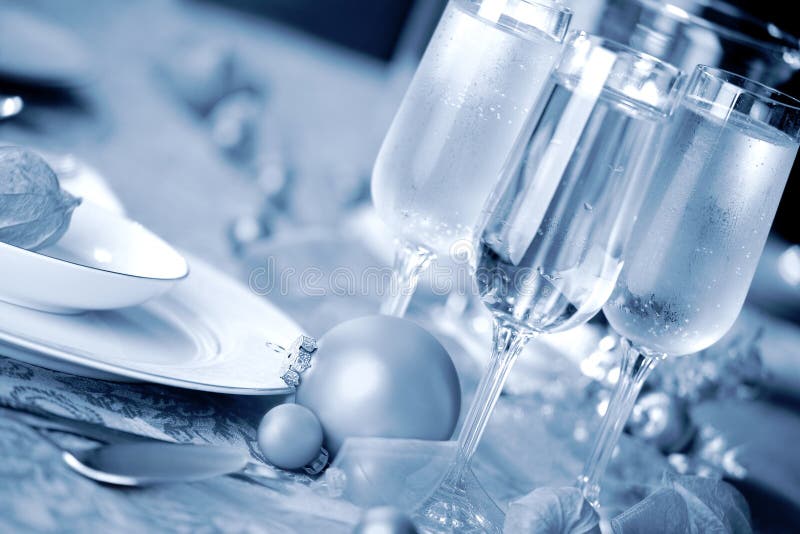 Elegant Christmas table setting in cool blue tones royalty free stock images