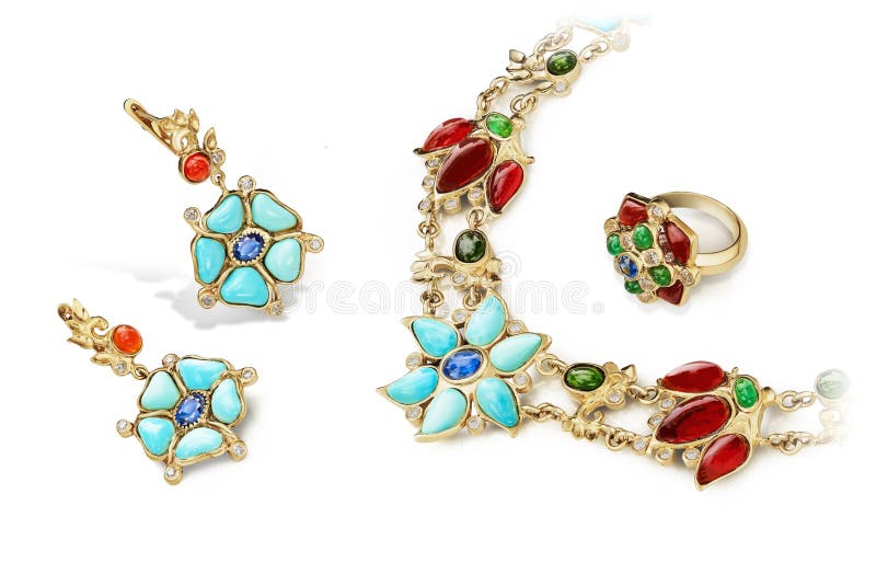 Elegant and fashion jewellery golden set of rings, earrings and necklace with rubies, sapphires, emeralds, turquoise and diamonds stock images Elegant and fashion jewellery golden set of rings, earrings and necklace with rubies, sapphires, emeralds, turquoise and diamonds stock images