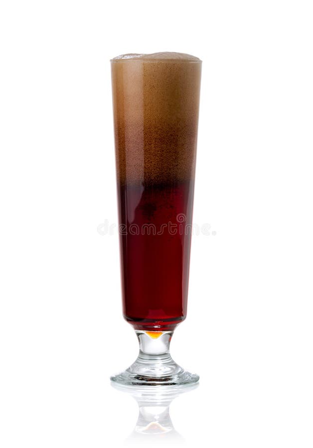 Elegant glass of cold dark beer with foam stock photography