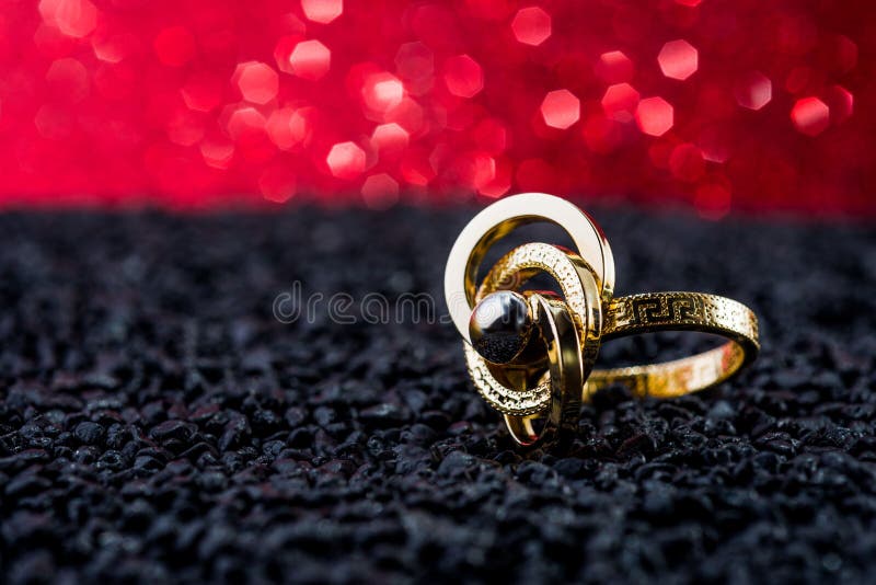 Elegant gold ring with intricate design. royalty free stock image