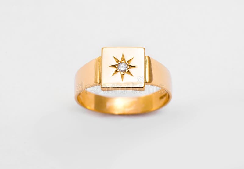 Elegant Gold Ring with Star Diamond Setting royalty free stock image
