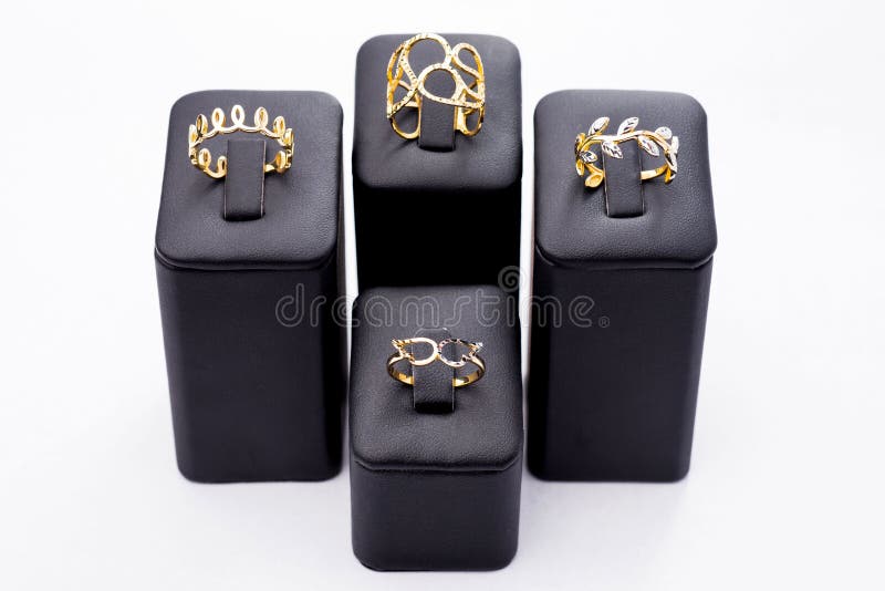 Elegant gold rings on display. stock images