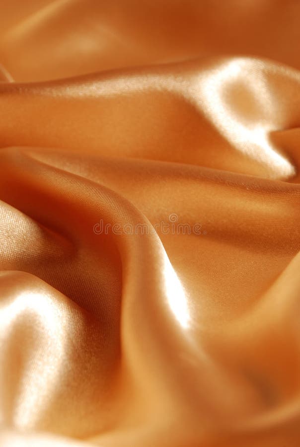 Elegant gold satin background royalty free stock photography