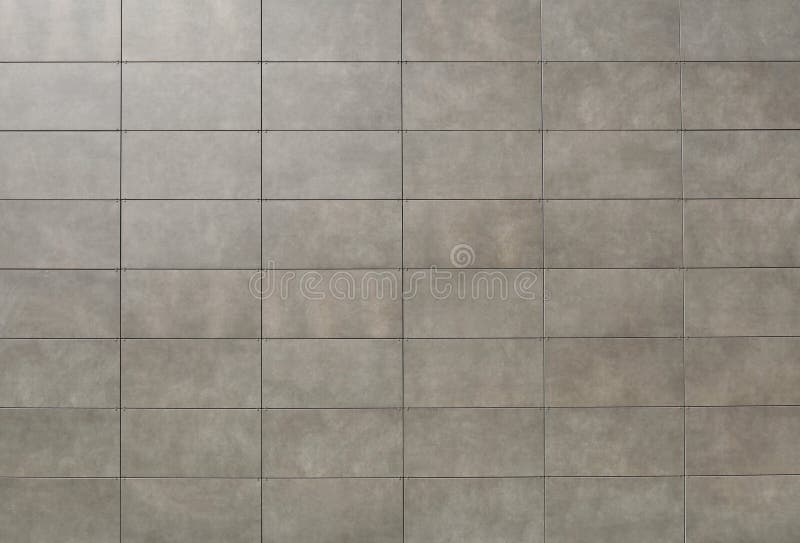 Elegant Gray Stone Tiles for Ventilated Facade Cladding. Stock Image