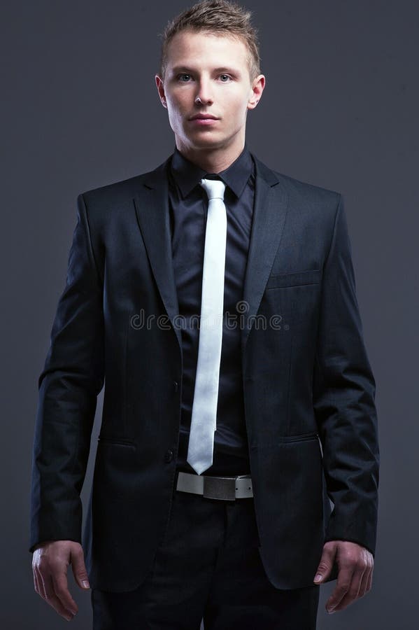 Elegant handsome man on grey background stock image