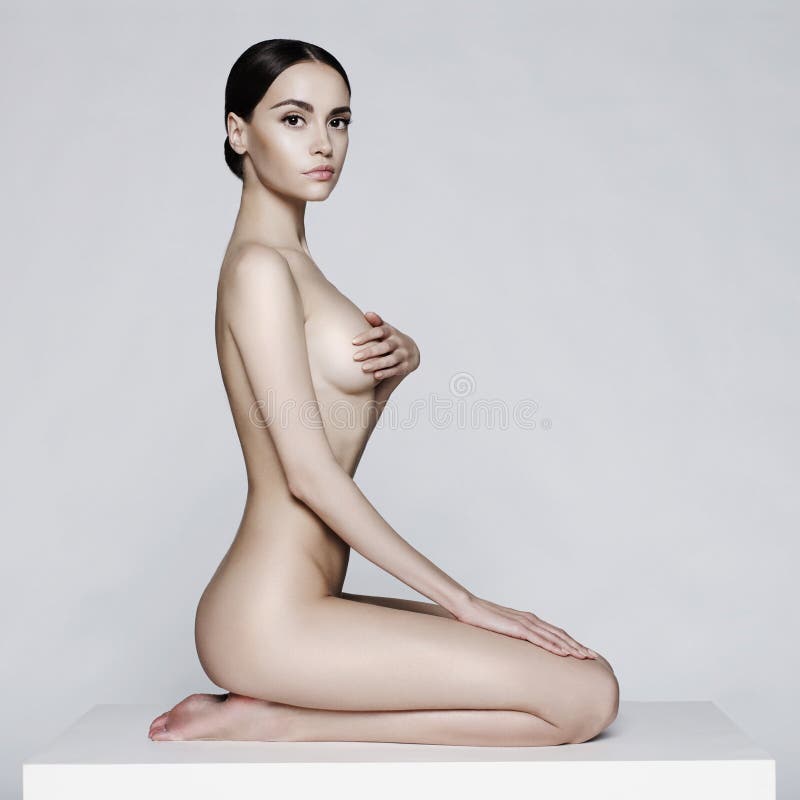 elegant ladysitting arkivfoto elegant ladysitting arkivfoto