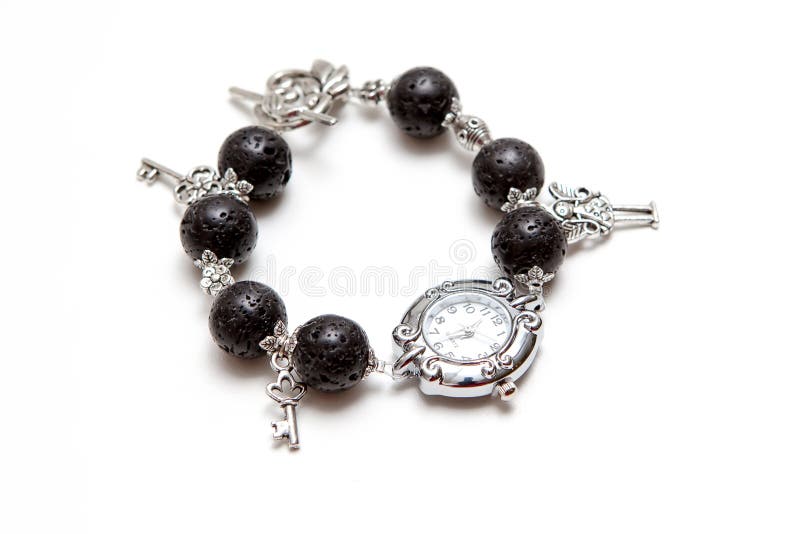 Elegant and modern bracelet made from volcanic lava rock with silver royalty free stock images