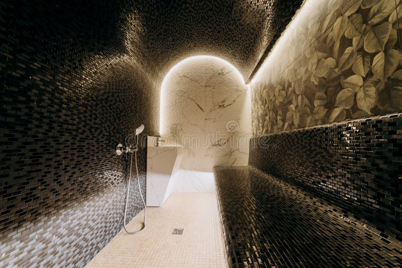 Elegant steam room with marble accents and soft lighting for a serene spa experience. High quality photo. Pampering experience stock images, royalty-free photos and pictures