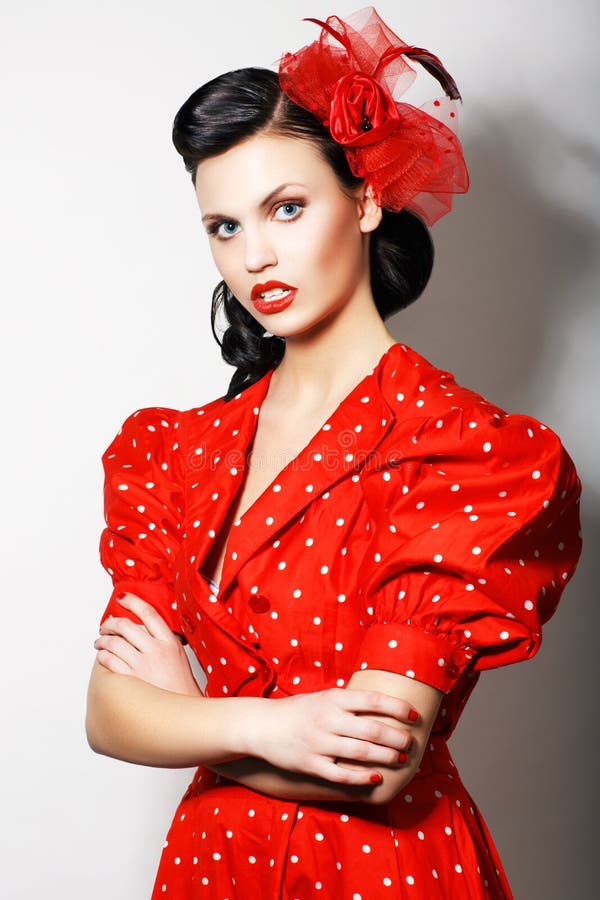 Elegant Strict Lady In Red Retro Dress With Crossed Hands 