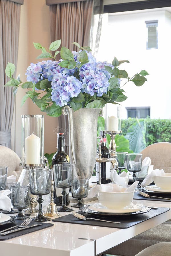 Elegant table set on marble dining table in modern style dining room