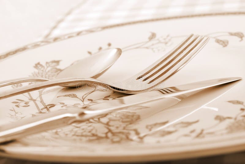 Elegant Table Setting in Sepia Tone Stock Photo - Image of fork, plate ...