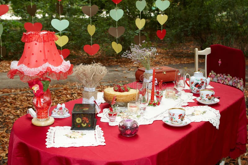 Romance red tea table party for lovers outdoor. Romance red tea table party for lovers outdoor