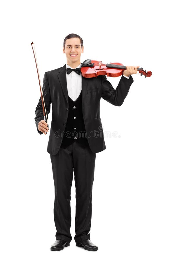 Elegant ung musiker som rymmer en fiol royaltyfri bild